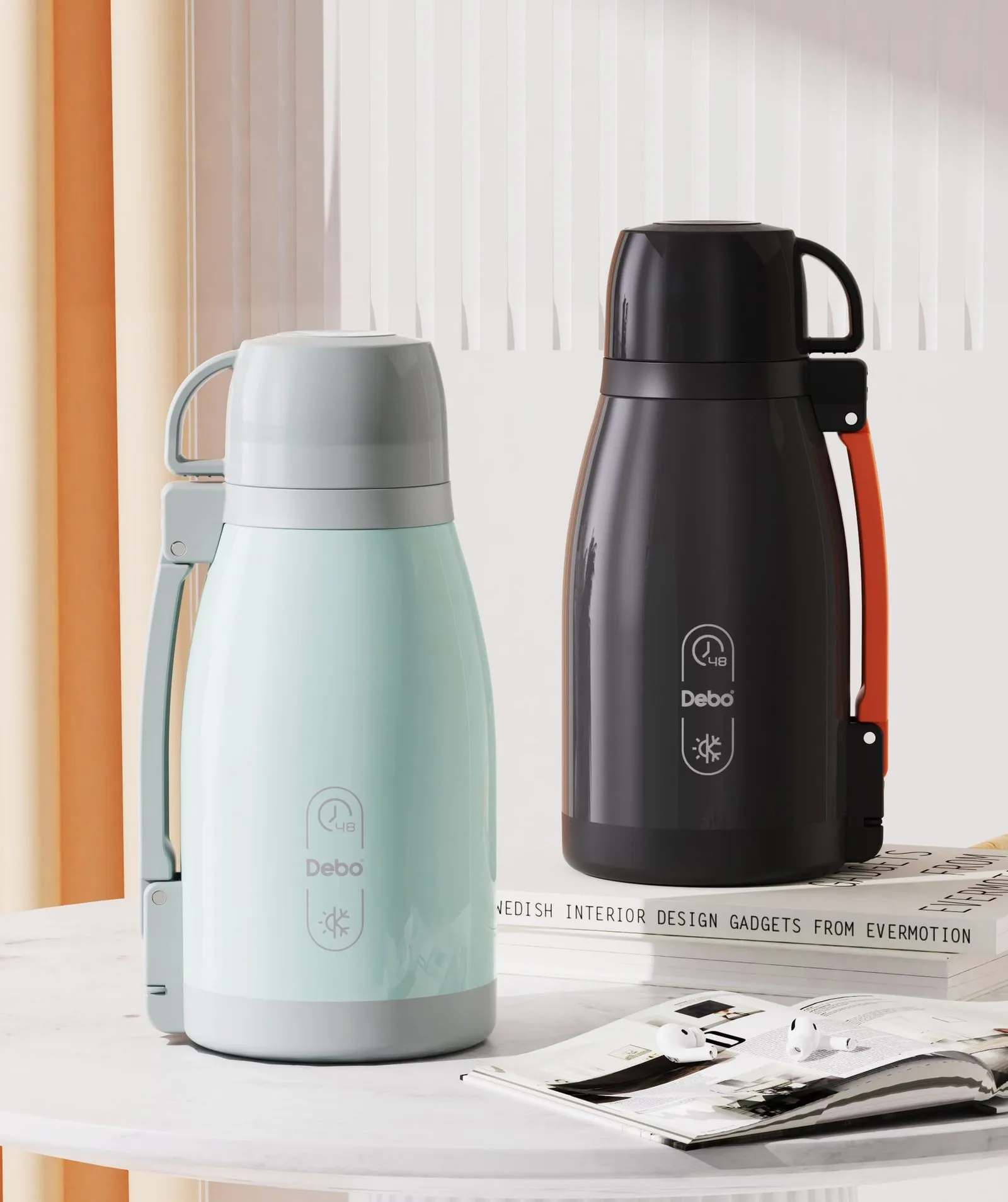 Two Debo insulated jugs, mint green and black, on a round table