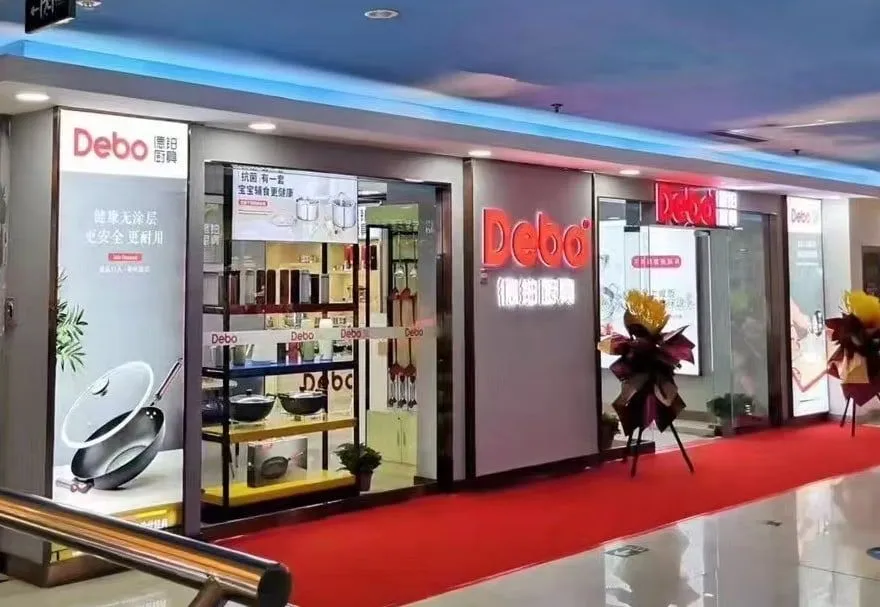 A newly opened Debo store with a red carpet and flower baskets